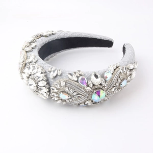Detailed close-up of Baroque rhinestone headband with grey fabric and sparkling crystals