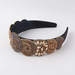 Detailed view of Baroque headband with intricate beads and crystal embroidery