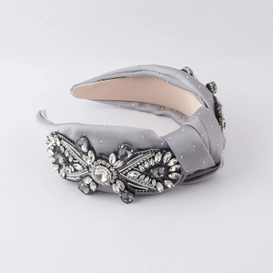 Elegant gray baroque satin headband with sparkling rhinestones and knot detail