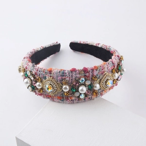 Detail of tweed headband with colorful rhinestones, crystals and faux pearls