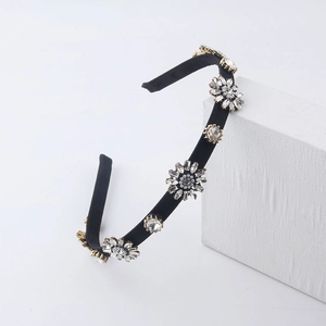 Elegant black velvet headband with sparkling rhinestone snowflakes and waterdrop crystals