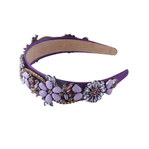 Baroque floral headband with purple rhinestones and crystal flower detailing on satin fabric