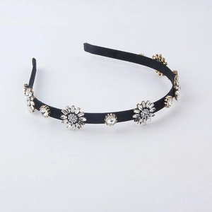 Elegant thin black headband with sparkling rhinestone snowflake and water drop crystals