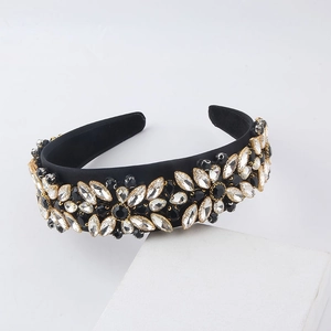 Detailed view of Baroque headband with black and clear rhinestones on wide fabric base