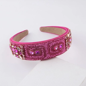 Detail of handmade beaded headband with pink rhinestones and anti-slip suede lining