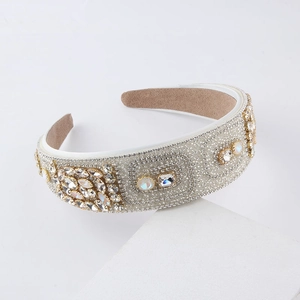 Baroque style wide headband with luxury white pearls and sparkling crystals on white blocks