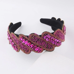 Baroque style fuchsia rhinestone headband with luxury wave pattern on black velvet fabric