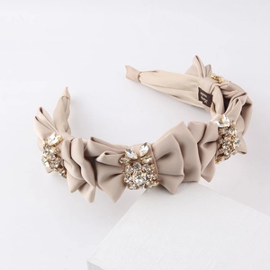 Serre-tête plissé beige champagne élégant orné de fleurs en strass scintillants