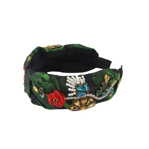 Cerchietto floreale ricamato con perline e cristalli su tessuto jacquard verde