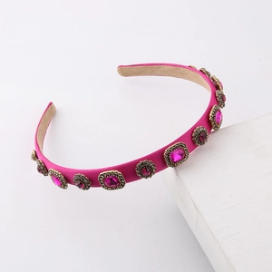 Elegant rose red headband with pink gemstones and gold metal lace in luxury fashion style