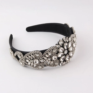 Luxury baroque headband featuring intricate floral rhinestones on black fabric for parties
