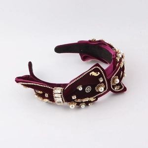 Luxurious burgundy velvet headband featuring pearls and crystals for party hair styling