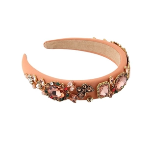 Baroque style peach pink headband with sponge padding, rhinestones, and butterfly detail