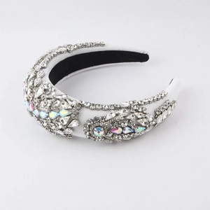Close-up of Baroque sponge headband with white rhinestones and teardrop jewels