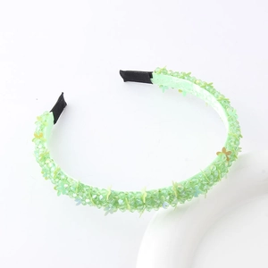 Fashionable handmade light green beaded headband with crystal flower sequins on white base