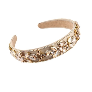 Baroque style headband with champagne rhinestones and floral crystals on beige fabric