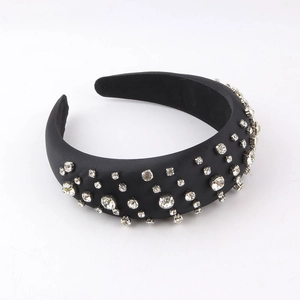 Chic black sponge headband with sparkling white rhinestones in a baroque fashion style