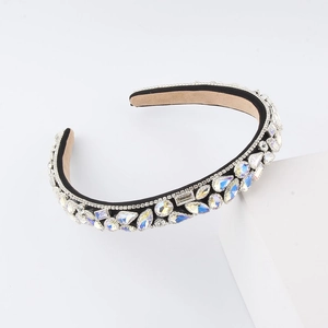 Close-up of luxury sponge headband with multi-cut rhinestones and soft inner velvet