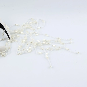 Baroque style bridal headband with white pearl tassels and rhinestone accents for weddings