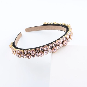 Elegant luxury headband with double-row pink rhinestones on a gold metal frame