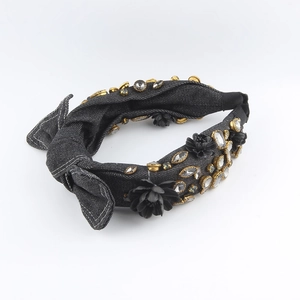 Baroque style denim headband with black fabric flowers and sparkling rhinestones