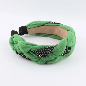Detail of green woven headband with sparkling rhinestones and non-slip inner lining