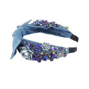 Baroque denim headband with blue rhinestones and gray floral accents on white background