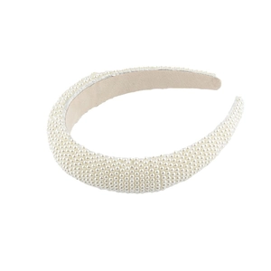 Elegant wide sponge headband featuring white faux pearl embellishments and velvet lining