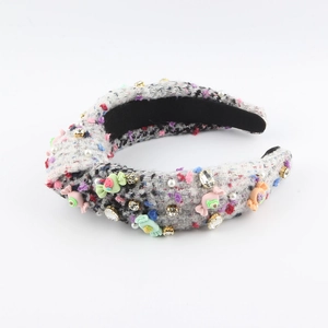 Serre-tête noeud en tweed gris orné de bonbons colorés en résine et strass brillants