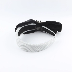 Fashion velvet bow headband with silver diamond pattern and pearl accent detail
