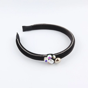 Elegant black velvet headband with sparkling rhinestones and delicate pearls for women