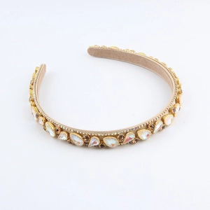 Detail of crystal headband featuring AB colorful teardrop rhinestones on gold base