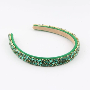 Serre-tête luxe vert émeraude avec strass brillants et monture dorée élégante