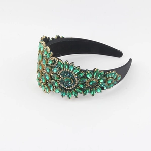 Baroque floral headband with green crystals and rhinestones on black velvet base