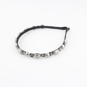 French vintage headband with silver metal oval decor and gray crystals on black frame