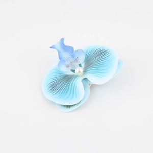 Fermaglio per capelli orchidea blu con petali sfumati e centro di perle