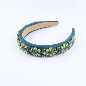 Baroque wide headband with green floral rhinestones on deep blue fabric base