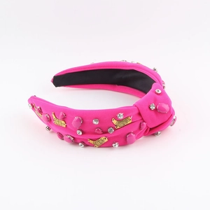 Exquisite fuchsia wide fabric headband with gold boots, gems and rhinestone detailing