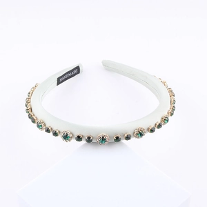French vintage headband with green crystals and small diamonds on light grey silk