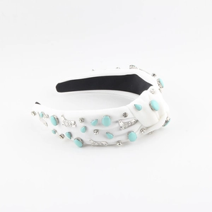 Bohemian white knotted fabric headband with turquoise stones and rhinestone bird details
