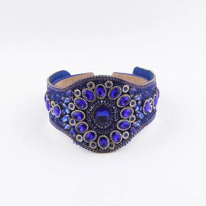 Luxurious royal blue velvet headband with sparkling rhinestones and crystal jewels