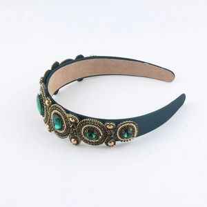 Baroque vintage green headband with gold embroidery and green gemstone detailing