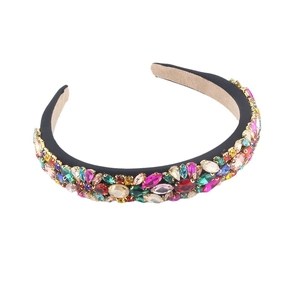 Luxury Baroque style headband with colorful rhinestones and gold settings on a black band