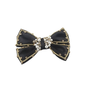 Elegant black satin bow hair clip with gold trim, pearls and rhinestones decoration