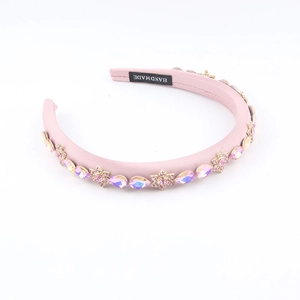 Rosafarbener Strass-Blumenhaarreif mit handgefertigtem Etikett und edlem Kristallbesatz