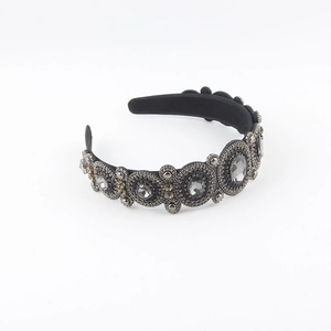 Detailed view of Baroque velvet headband with grey crystals and silver seed beads