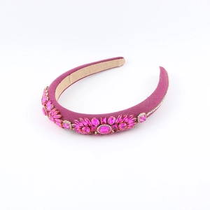 Close-up of rose purple velvet headband with handcrafted Baroque crystal rhinestones