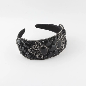 Detail of baroque wide headband with large black crystals and micro rhinestones