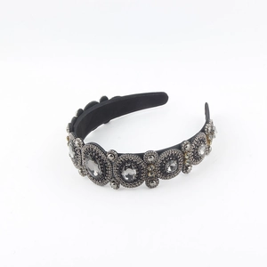 Detail view of Baroque grey crystal headband with intricate beadwork and rhinestones