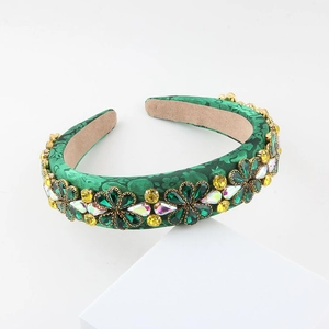 Vintage green satin headband featuring luxury emerald crystal flowers and glass rhinestones